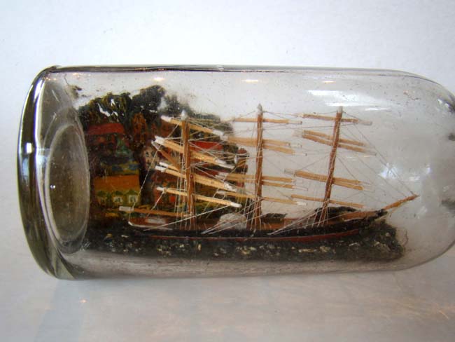 A late 19th or early 20th century ship in a bottle